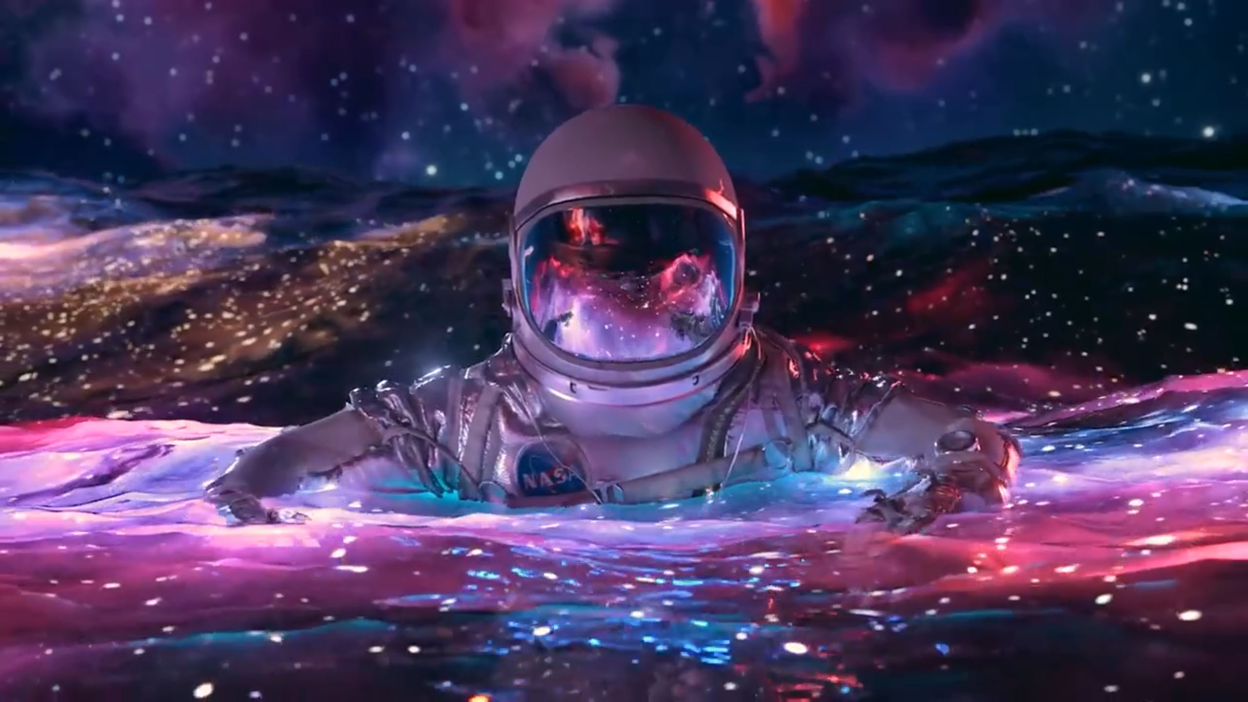 Man floating in liquid galaxy